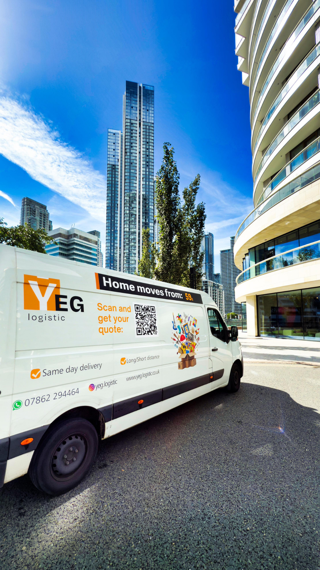 Professional movers carefully loading a van